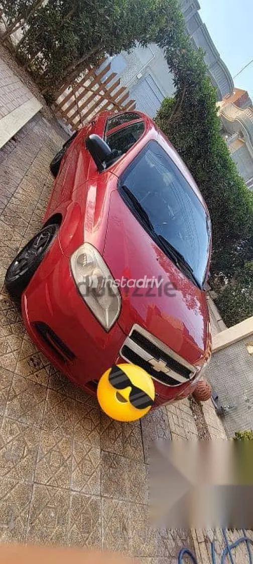 شيفروليه افيو 2009 أحمر مستعملة للبيع - 9