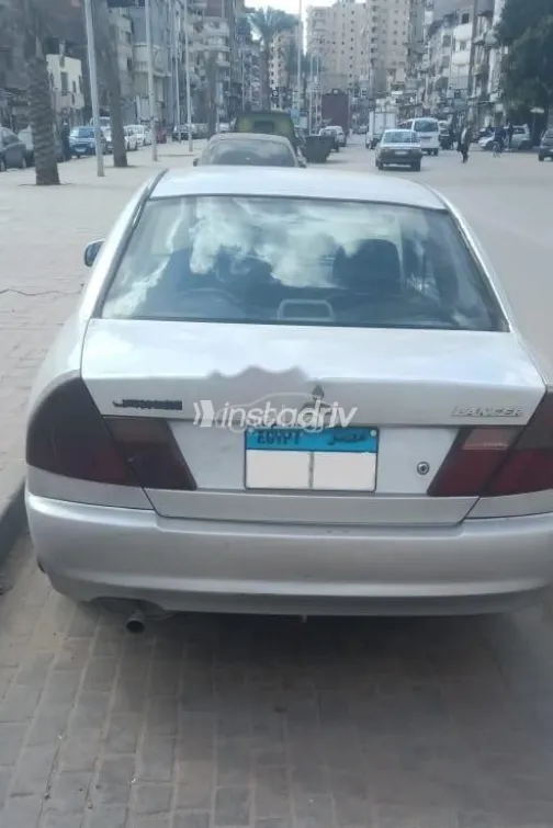 ميتسوبيشي لانسر 2000 فضي مستعملة للبيع - 2