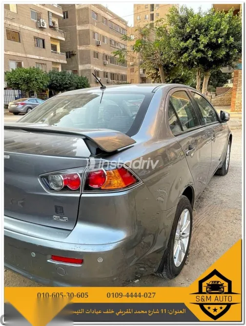 ميتسوبيشي لانسر 2015 فضي مستعملة للبيع - 3