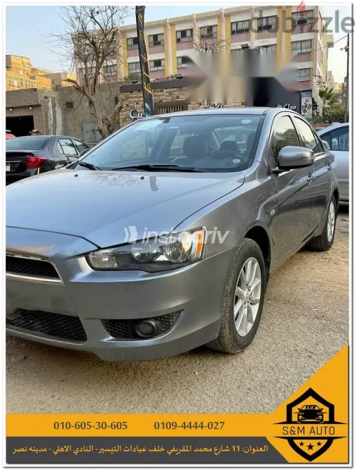 ميتسوبيشي لانسر 2015 فضي مستعملة للبيع - 4