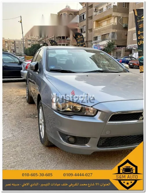 ميتسوبيشي لانسر 2015 فضي مستعملة للبيع - 6