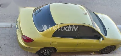 كيا ريو 2001 ذهبي مستعملة للبيع - 2
