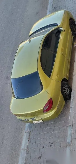 كيا ريو 2001 ذهبي مستعملة للبيع