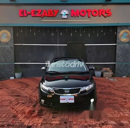 كيا سيراتو 2010 أسود مستعملة للبيع - 1