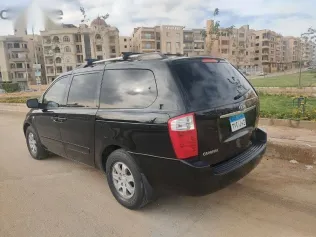 كيا كارنفال 2010 أسود مستعملة للبيع