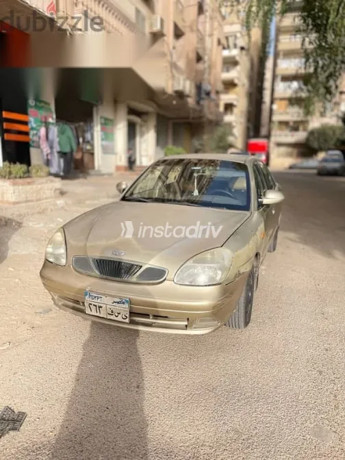 دايو نوبيرا 1999 ذهبي مستعملة للبيع - 1
