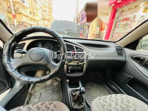 دايو لانوس 2005 أبيض مستعملة للبيع - 1