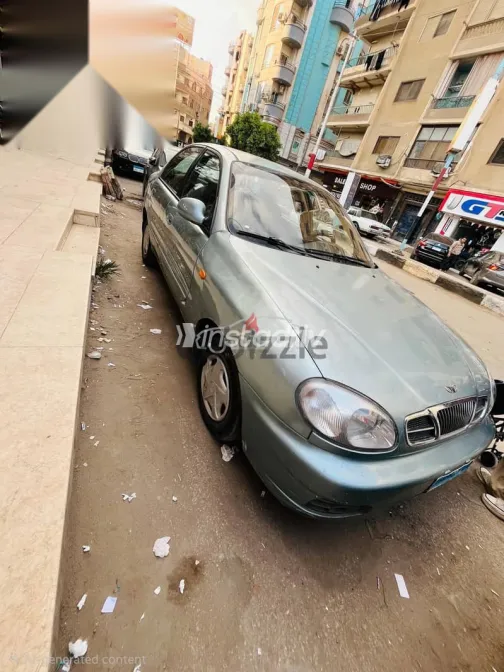 دايو لانوس 2005 أبيض مستعملة للبيع - 2