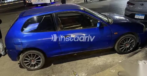 ميتسوبيشي كولت 2003 أزرق غامق مستعملة للبيع - 1