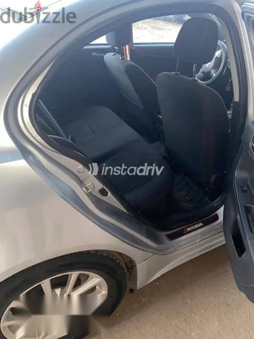 ميتسوبيشي لانسر 2015 فضي مستعملة للبيع - 7