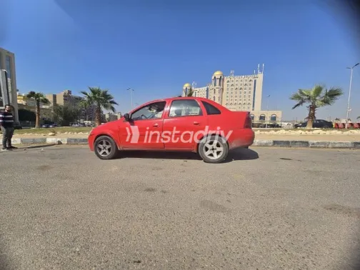 اوبل كورسا 2003 أحمر مستعملة للبيع - 2