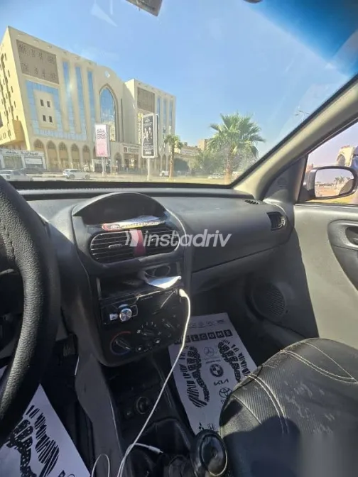 اوبل كورسا 2003 أحمر مستعملة للبيع - 3