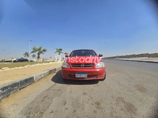 اوبل كورسا 2003 أحمر مستعملة للبيع - 4