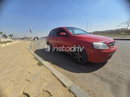 اوبل كورسا 2003 أحمر مستعملة للبيع - 5