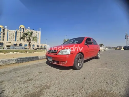 اوبل كورسا 2003 أحمر مستعملة للبيع - 7