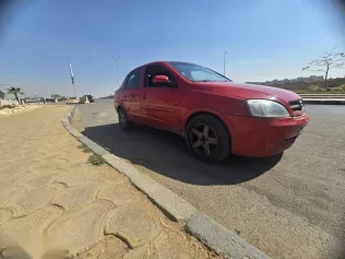 اوبل كورسا 2003 أحمر مستعملة للبيع