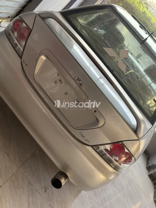 ميتسوبيشي لانسر بومة 2005 شامبين مستعملة للبيع - 1