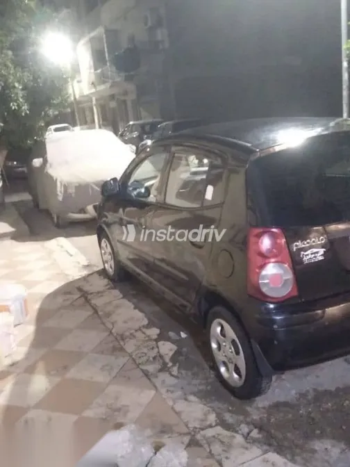 كيا بيكانتو 2010 أسود مستعملة للبيع - 1