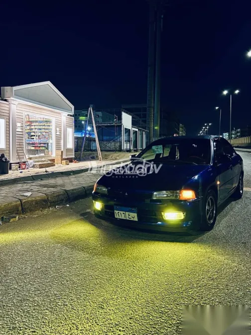 ميتسوبيشي لانسر 1998 أزرق غامق مستعملة للبيع - 1