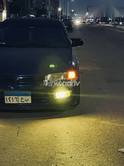 ميتسوبيشي لانسر 1998 أزرق غامق مستعملة للبيع - 2