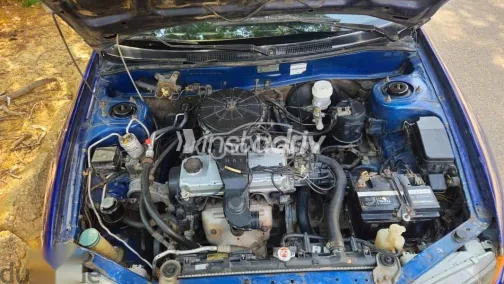 ميتسوبيشي لانسر 1998 أزرق غامق مستعملة للبيع - 7