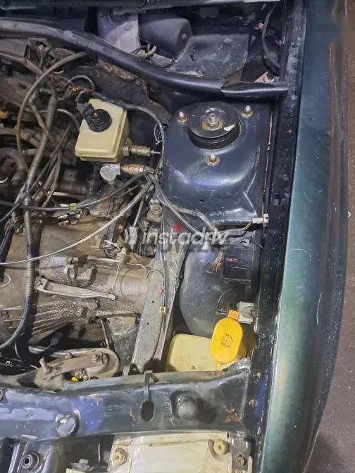 فورد اسكورت 1998 أخضر مستعملة للبيع - 4