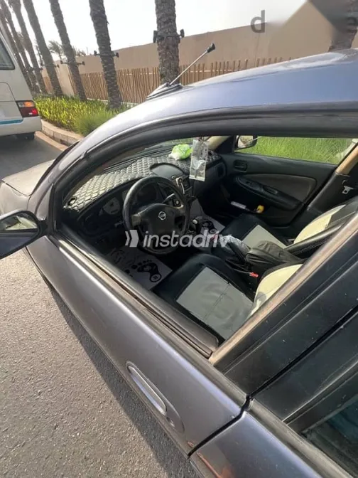 نيسان صنى 2010 أزرق غامق مستعملة للبيع - 5