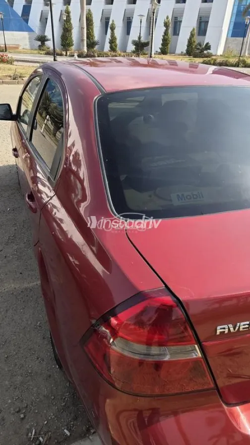 شيفروليه افيو 2013 أحمر مستعملة للبيع - 2