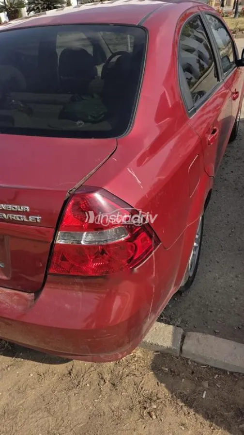 شيفروليه افيو 2013 أحمر مستعملة للبيع - 3