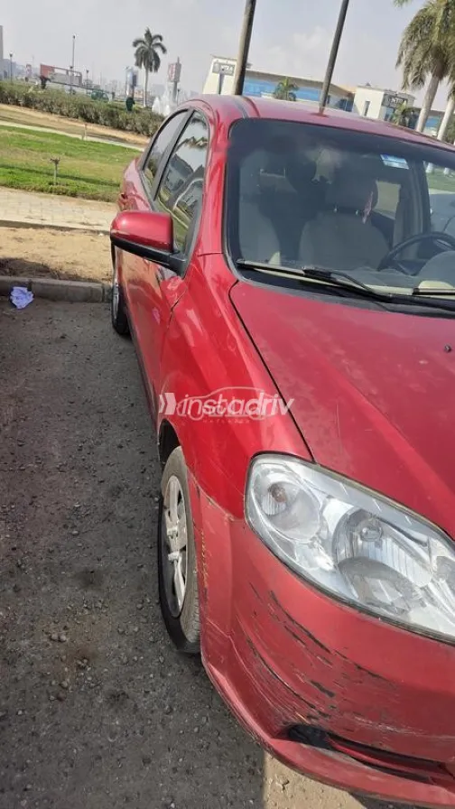 شيفروليه افيو 2013 أحمر مستعملة للبيع - 5