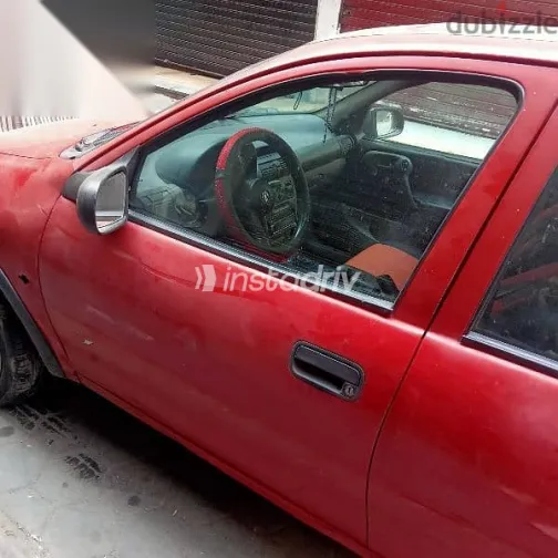 اوبل كورسا 1995 أحمر مستعملة للبيع - 5