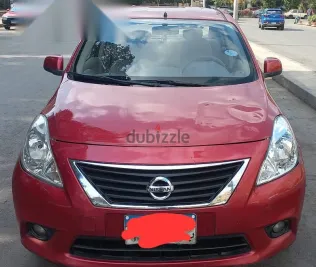 نيسان صنى 2014 أحمر مستعملة للبيع