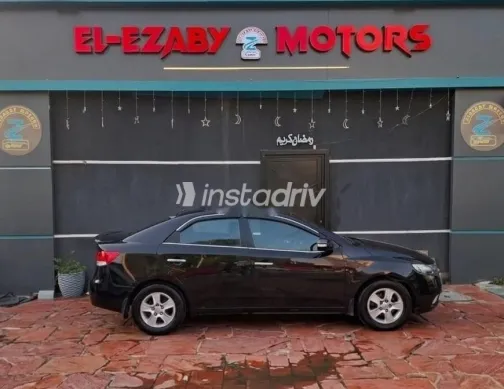 كيا سيراتو 2010 أسود مستعملة للبيع - 1