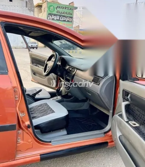 شيفروليه أوبترا 2007 برتقالي مستعملة للبيع - 10