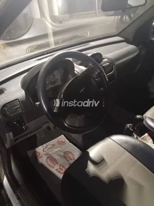 اوبل كورسا 2004 فضي مستعملة للبيع - 1