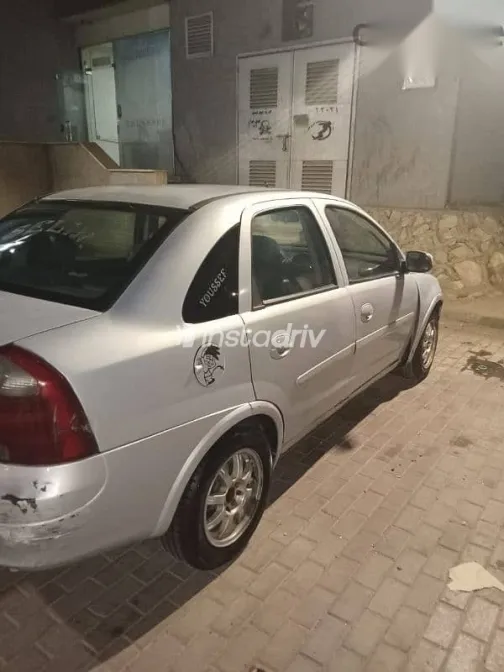 اوبل كورسا 2004 فضي مستعملة للبيع - 2