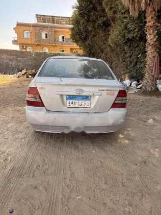 تويوتا كورولا 2004 فضي مستعملة للبيع