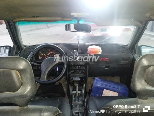 هيونداي اكسيل 1997 رمادي غامق مستعملة للبيع - 5