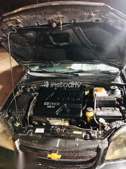 شيفروليه أوبترا 2009 أسود مستعملة للبيع - 1