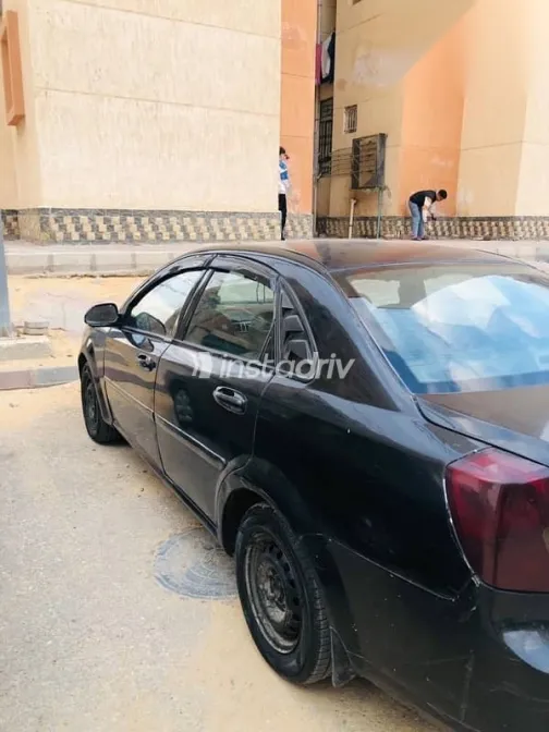 شيفروليه أوبترا 2009 أسود مستعملة للبيع - 2