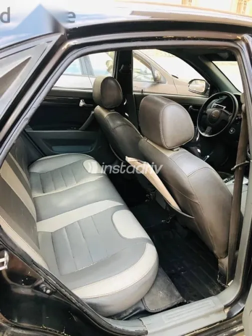 شيفروليه أوبترا 2009 أسود مستعملة للبيع - 3