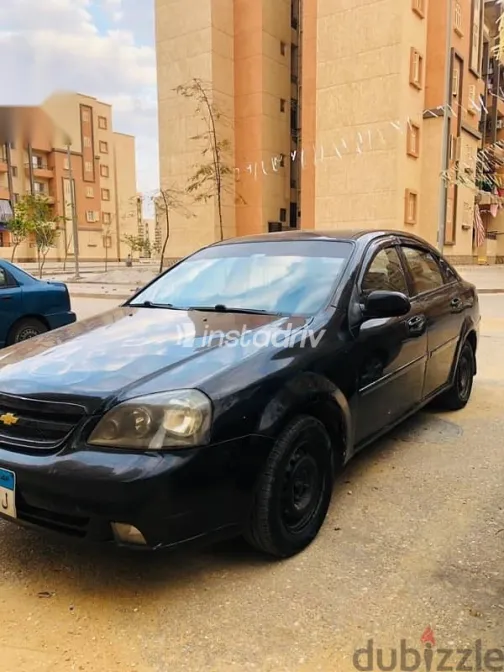 شيفروليه أوبترا 2009 أسود مستعملة للبيع - 4