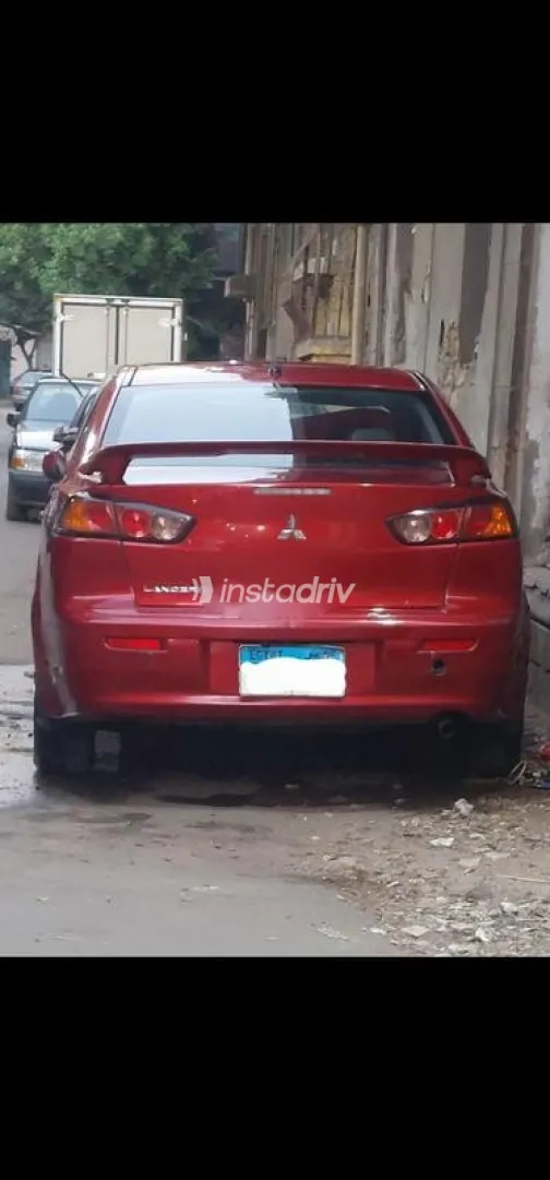 ميتسوبيشي لانسر اى اكس شارك 2008 أحمر غامق مستعملة للبيع - 2