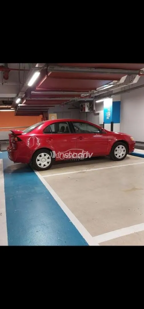 ميتسوبيشي لانسر اى اكس شارك 2008 أحمر غامق مستعملة للبيع - 3