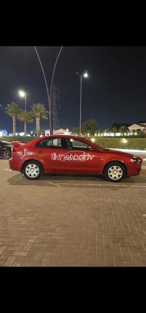 ميتسوبيشي لانسر اى اكس شارك 2008 أحمر غامق مستعملة للبيع - 4