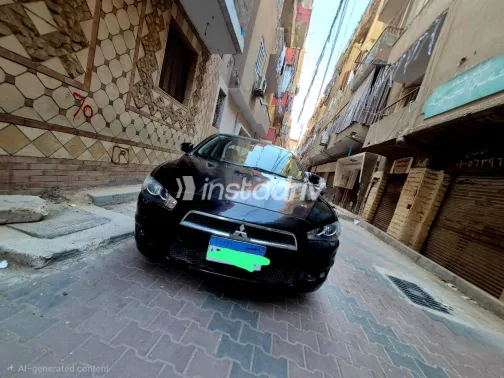 ميتسوبيشي لانسر اى اكس شارك 2015 أبيض مستعملة للبيع - 2