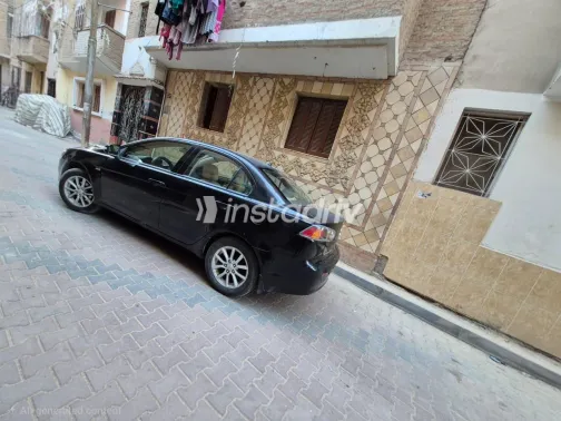 ميتسوبيشي لانسر اى اكس شارك 2015 أبيض مستعملة للبيع - 3