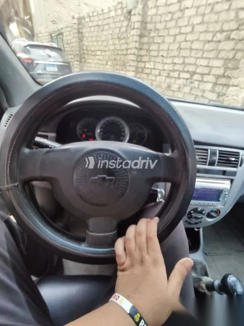 شيفروليه أوبترا 2010 أسود مستعملة للبيع - 5