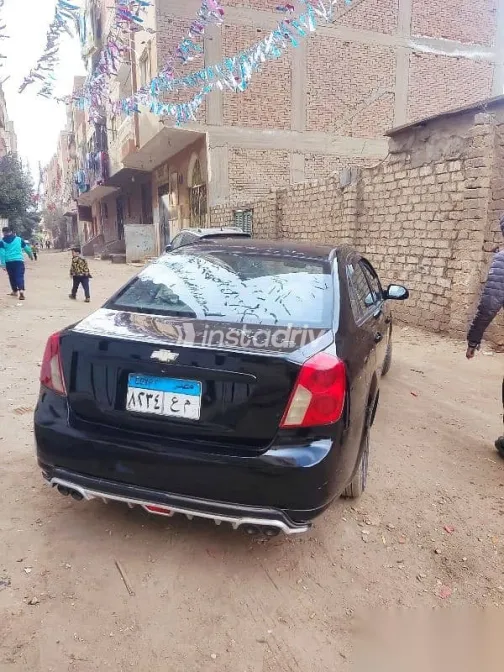 شيفروليه أوبترا 2010 أسود مستعملة للبيع - 7