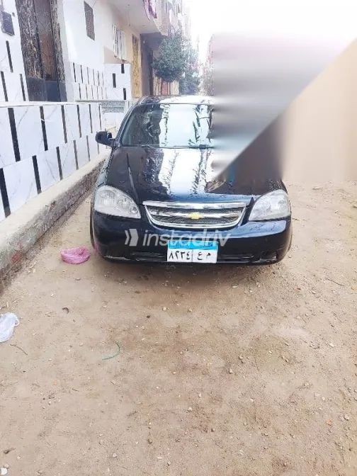 شيفروليه أوبترا 2010 أسود مستعملة للبيع - 10